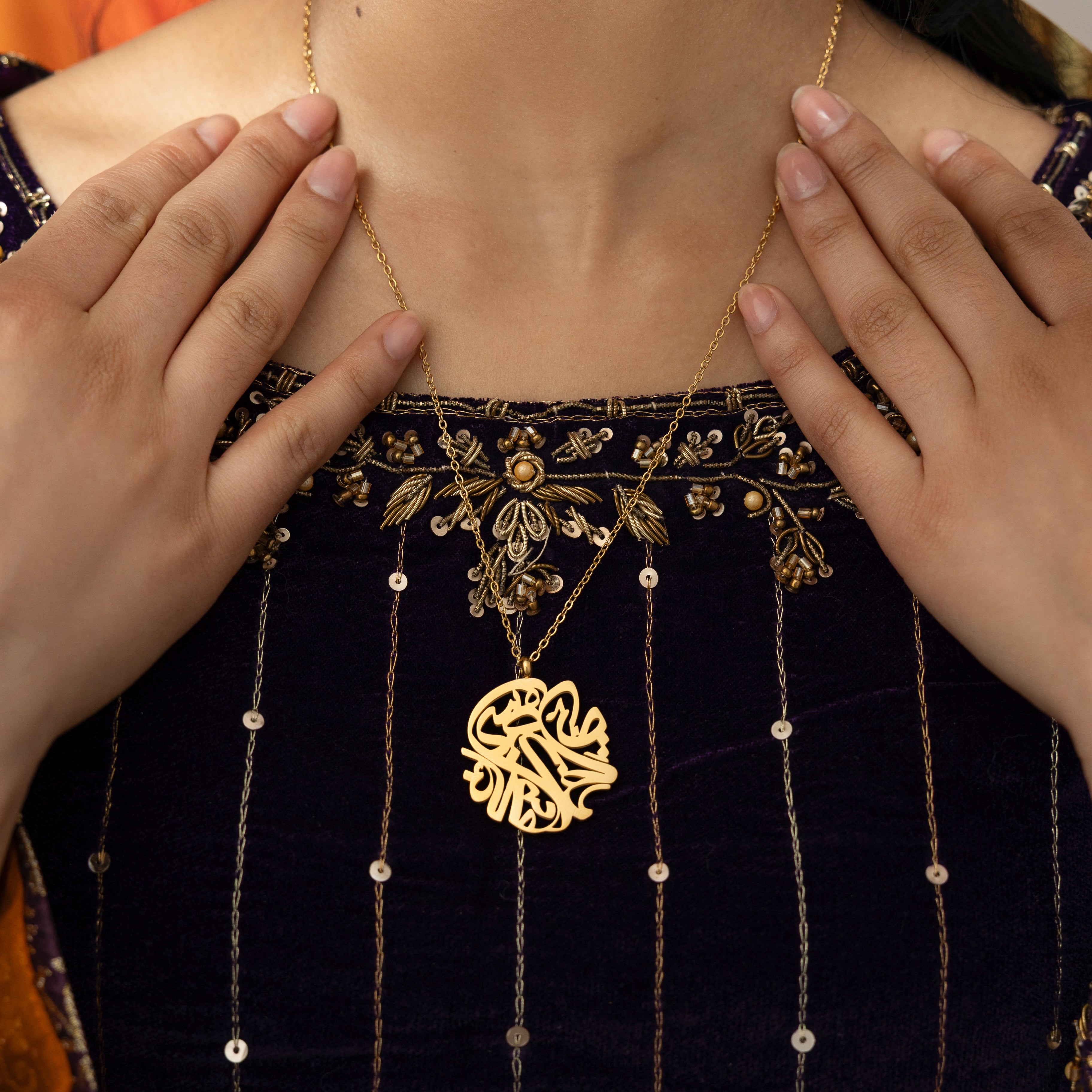 Nominal Relief Necklace by Aadil